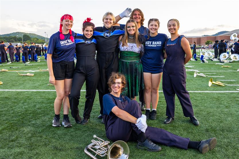 Students perform on football field